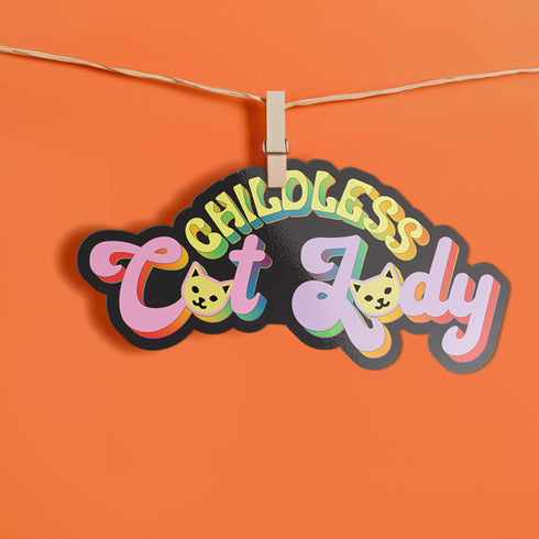 Bold "Childless Cat Lady" sticker with sassy typography and cat silhouettes, embodying feminist political pride.